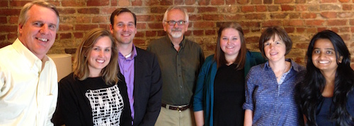 Perry Samson, center, poses with WDI President Paul Clyde, left, WDI Vice President of the Education Initiative Amy Gillett, second from right, and MAP team members.