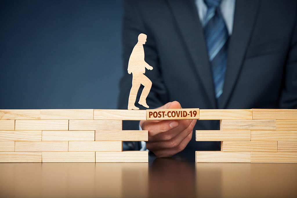 Post-Covid business concept of figure crossing bridge