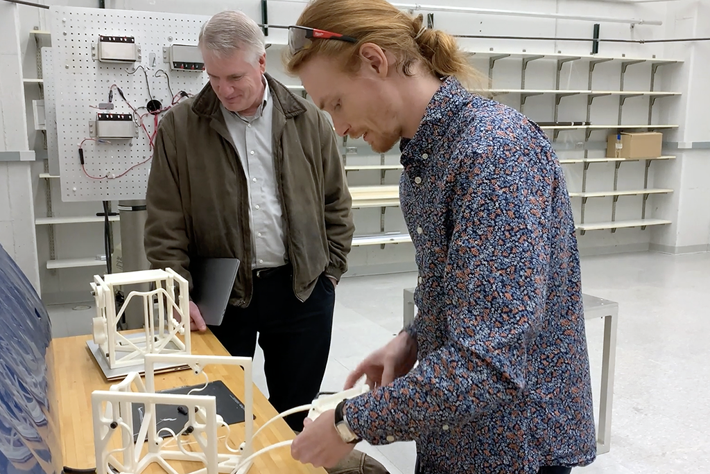 Paul Clyde looks at prototypes at U-M aerospace department.