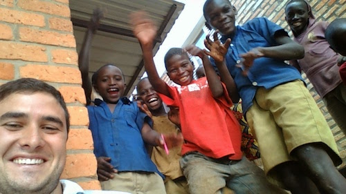 2015 WDI summer intern Julio Villasenor poses with some Rwandan children. This summer, WDI continues its long partnership with The Ihangane Project at Ruli District Hospital in Rwanda by sending summer intern Nana Asare there for a project. 